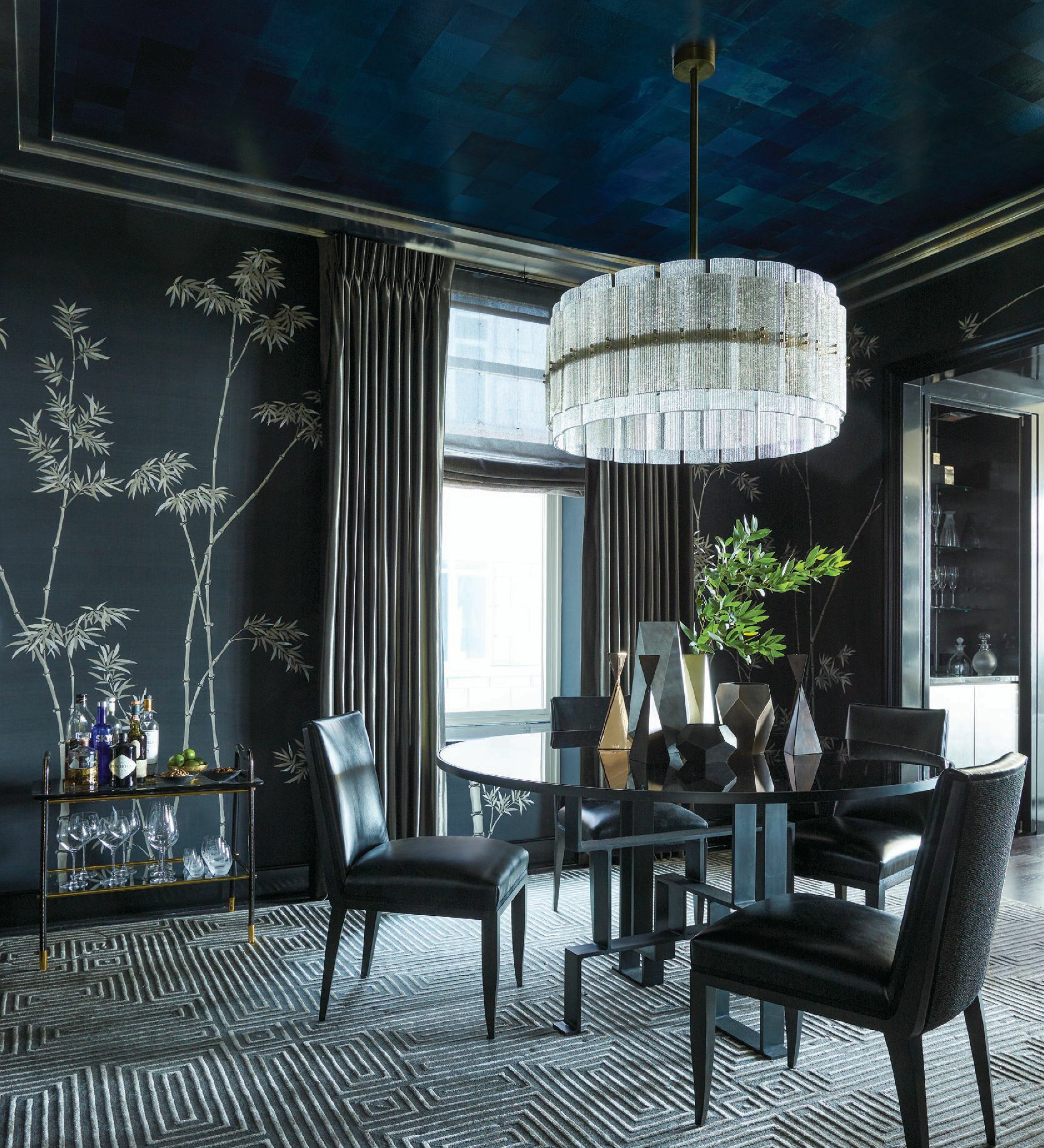 This moody Gold Coast project by Craig & Company seduces with wallpaper by de Gournay, rug by Scott Group, table by Jean de Merry, chairs by Holly Hunt and chandelier by L’Antiquaire. PHOTO COURTESY OF STEVEN HAULENBEEK STUDIO