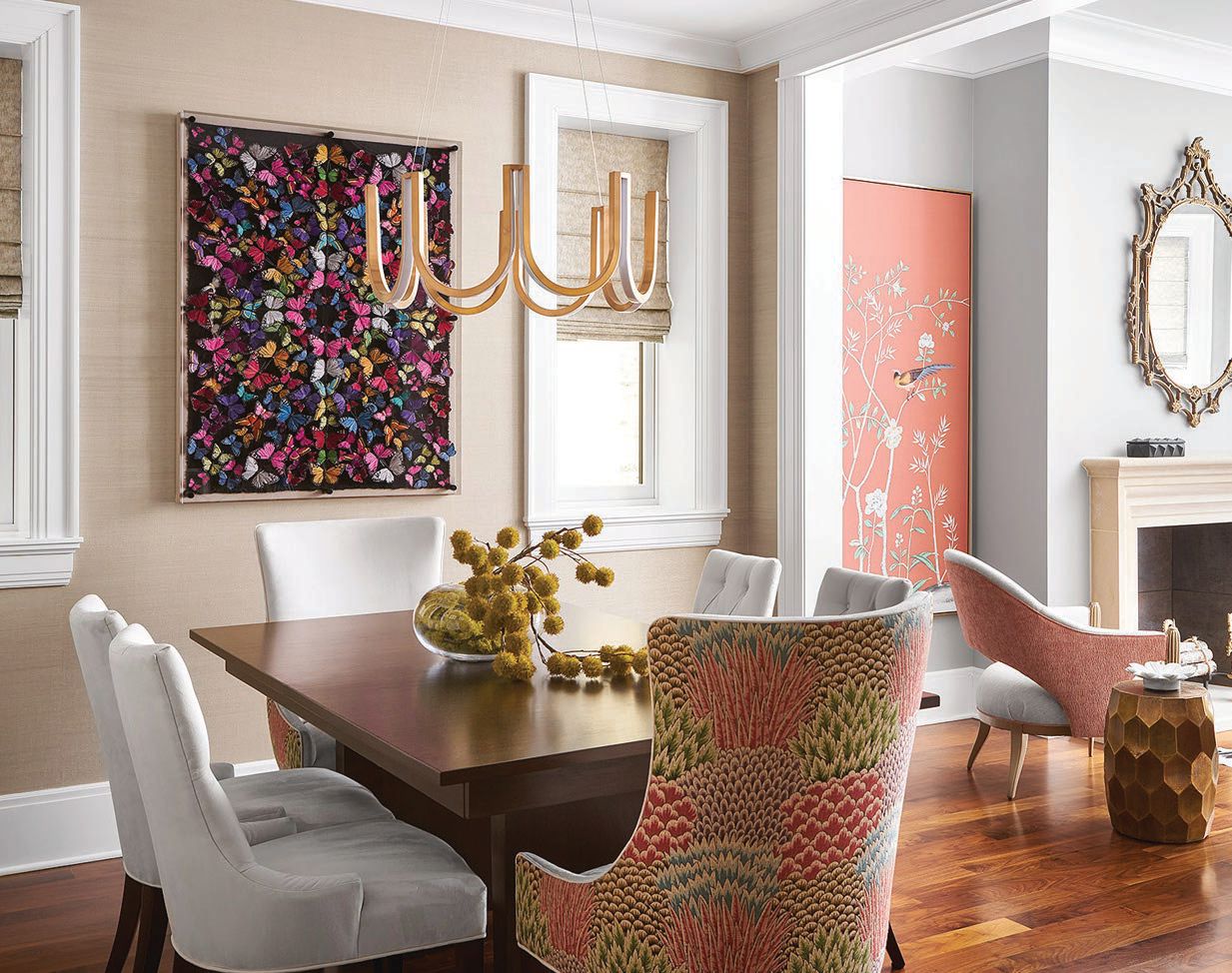 Colorful art by Trudy Lynn Elliott (@ trudylynnelliott) and a table by Eurocraft stand out in the dining room PHOTOGRAPHED BY RYAN MCDONALD