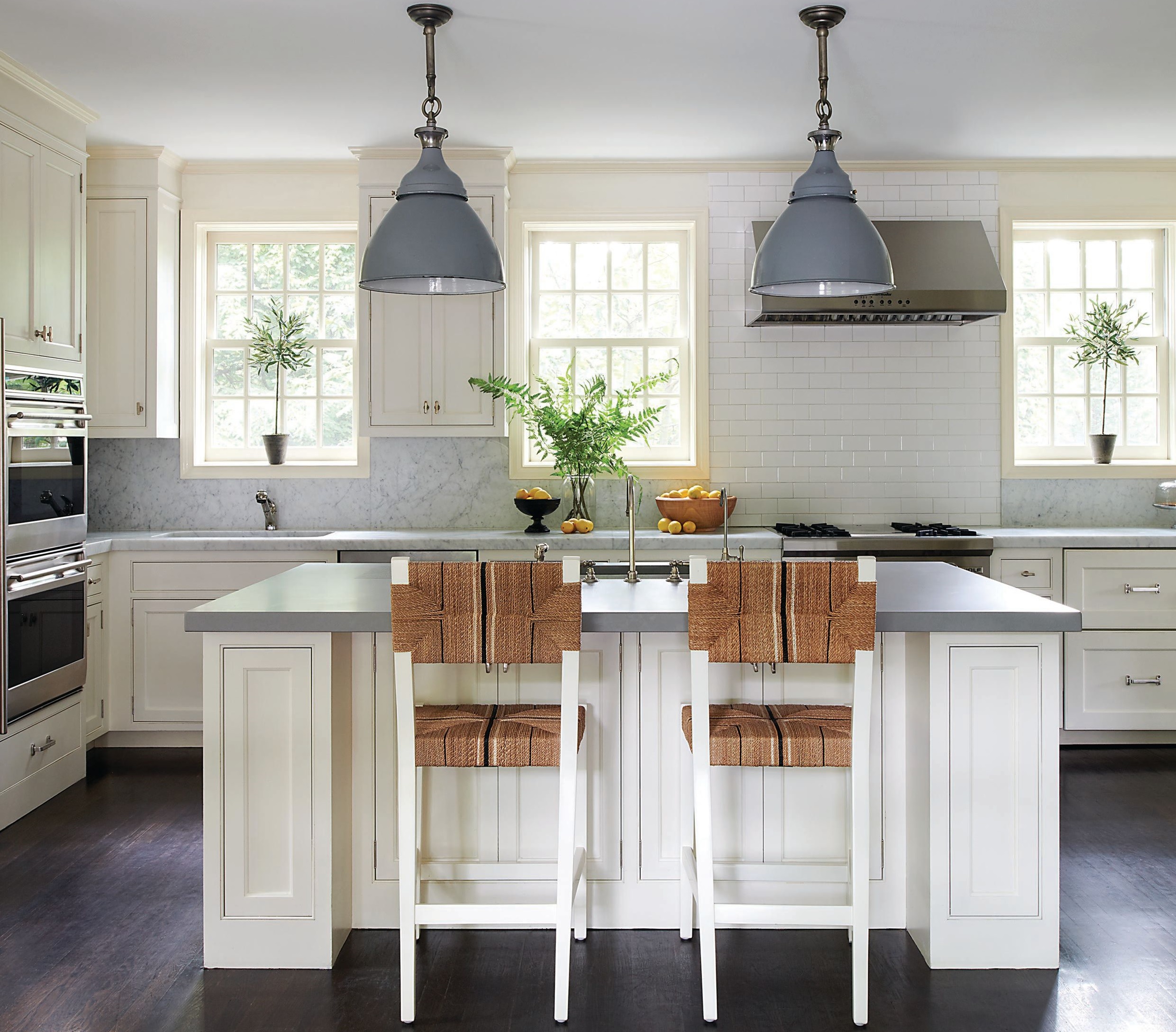 Counter stools in the kitchen were sourced from Serena & Lily. Photographed by Rebecca McAlpin