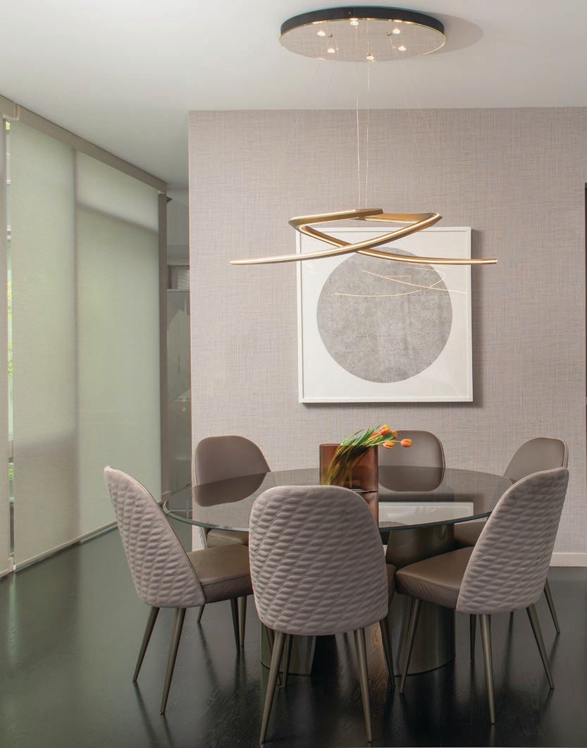 A Pininfarina Speedform chandelier hangs above the breakfast area Photographed by Angelika Friday