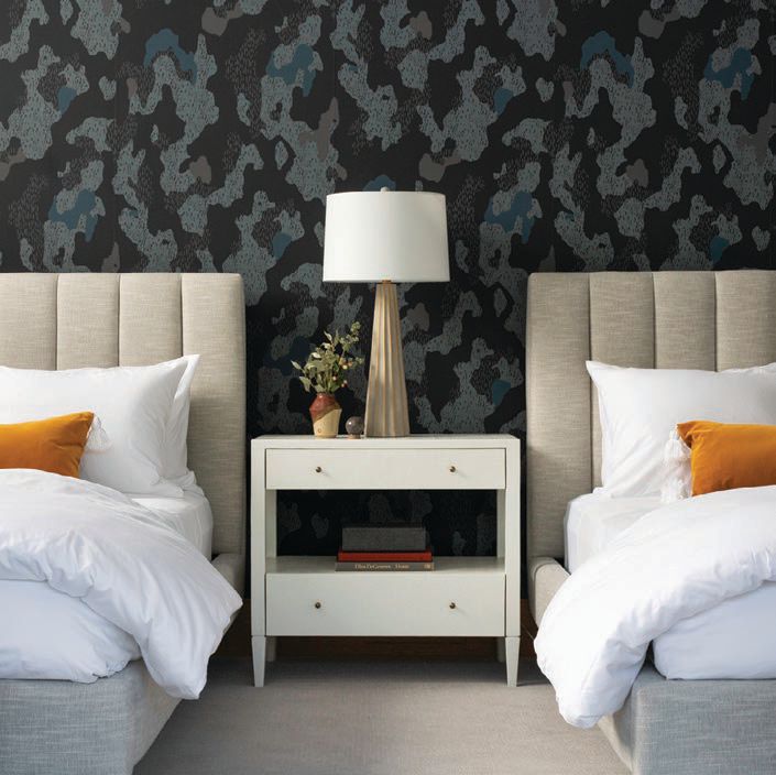 Sycamore wallpaper from the Lawson-Fenning collection for Hygge & West adds drama to a guest bedroom. Photographed by Ryan Hainey