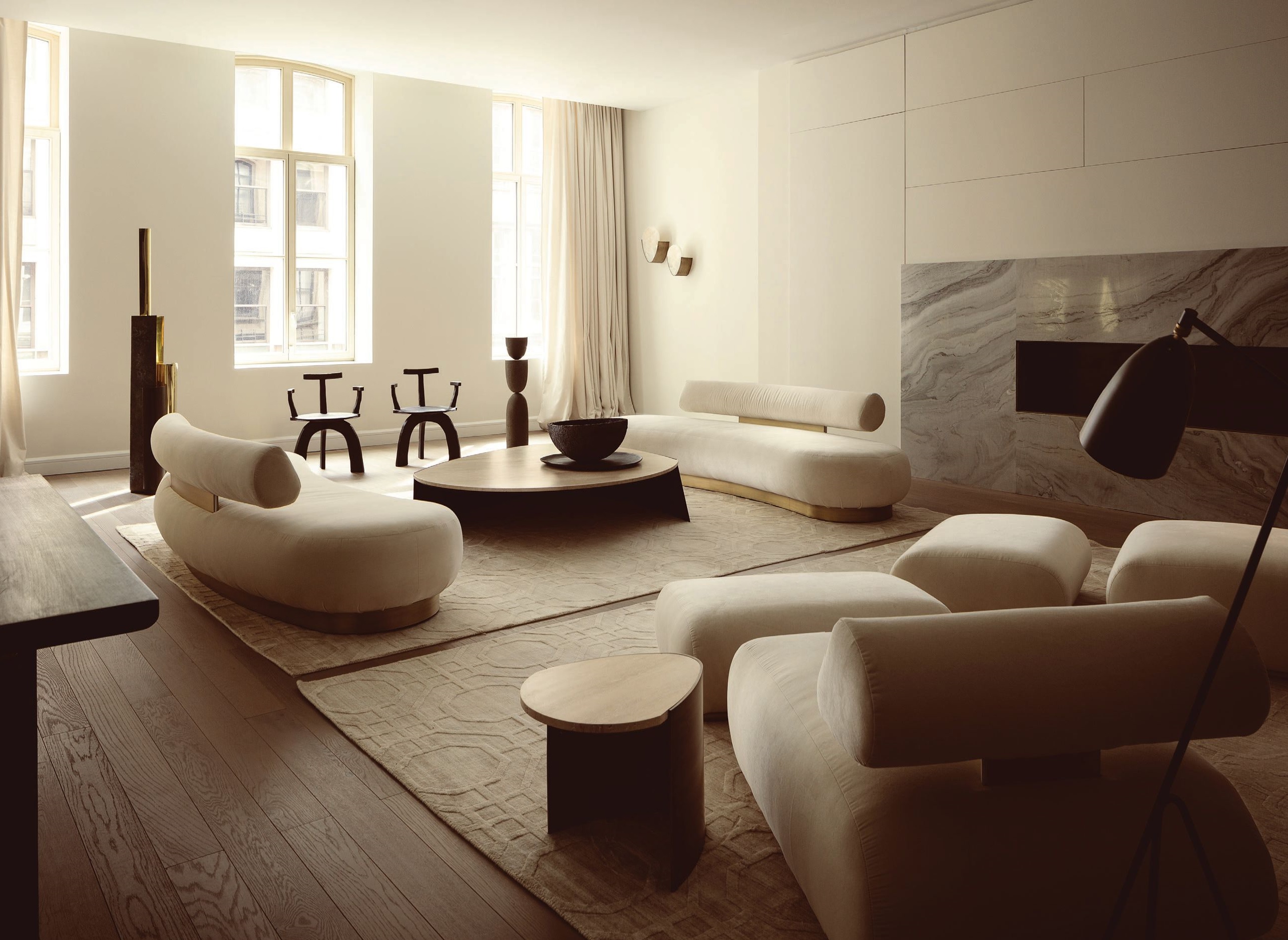 In the living room, custom sofas and tables by Atra. PHOTO COURTESY OF ATRA
