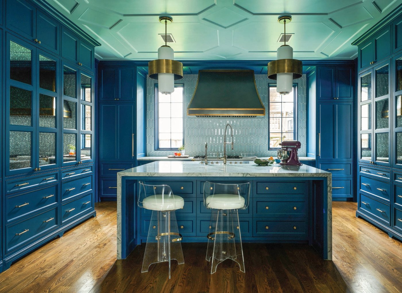 The kitchen offers a cool-hued environment perfect for fun dinners at home PHOTO BY JACK THOMPSON