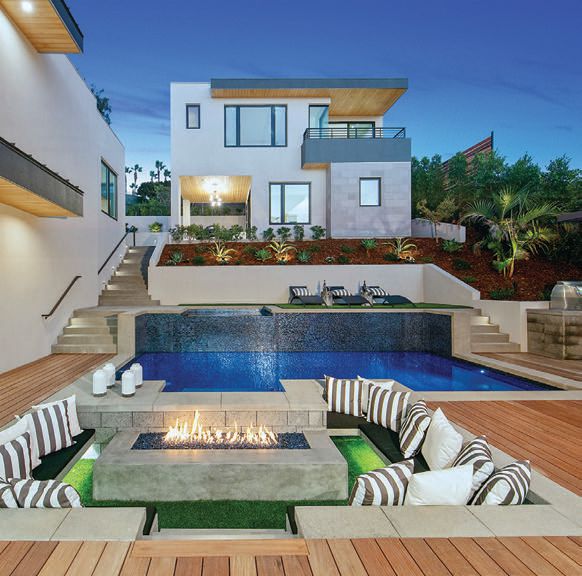 The pool area at this La Jolla gem includes a raised spa and sunken fire pit PHOTO BY: BRENT HAYWOOD