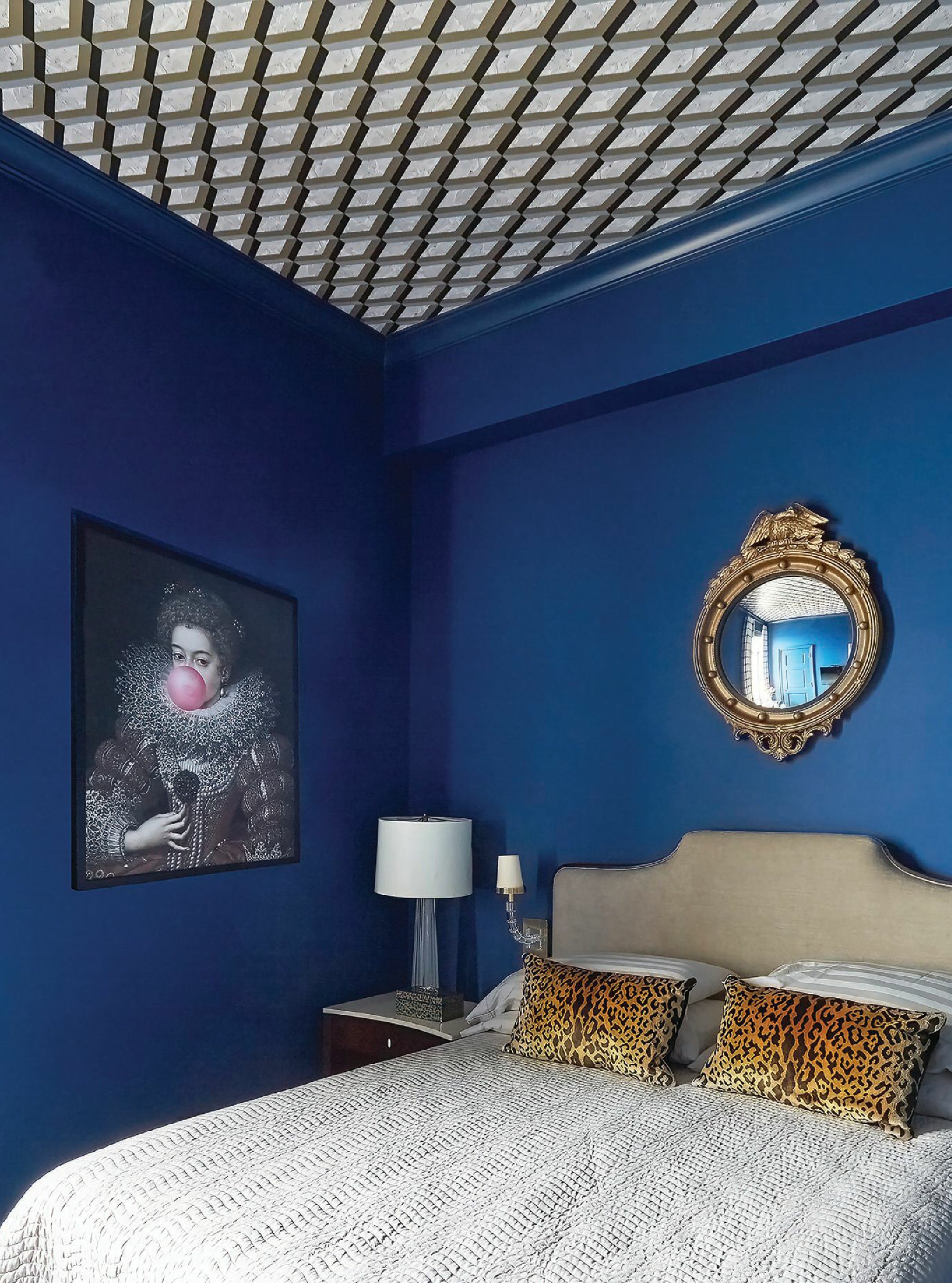 Queen of Color, indeed: Designer Jasmin Reese goes for the bold with walls in
Champion Cobalt by Benjamin Moore, an Osborne & Little wallcovering on the ceiling and a striking antique mirror in this Lincoln Park abode. PHOTO BY MICHAEL ALAN KASKEL