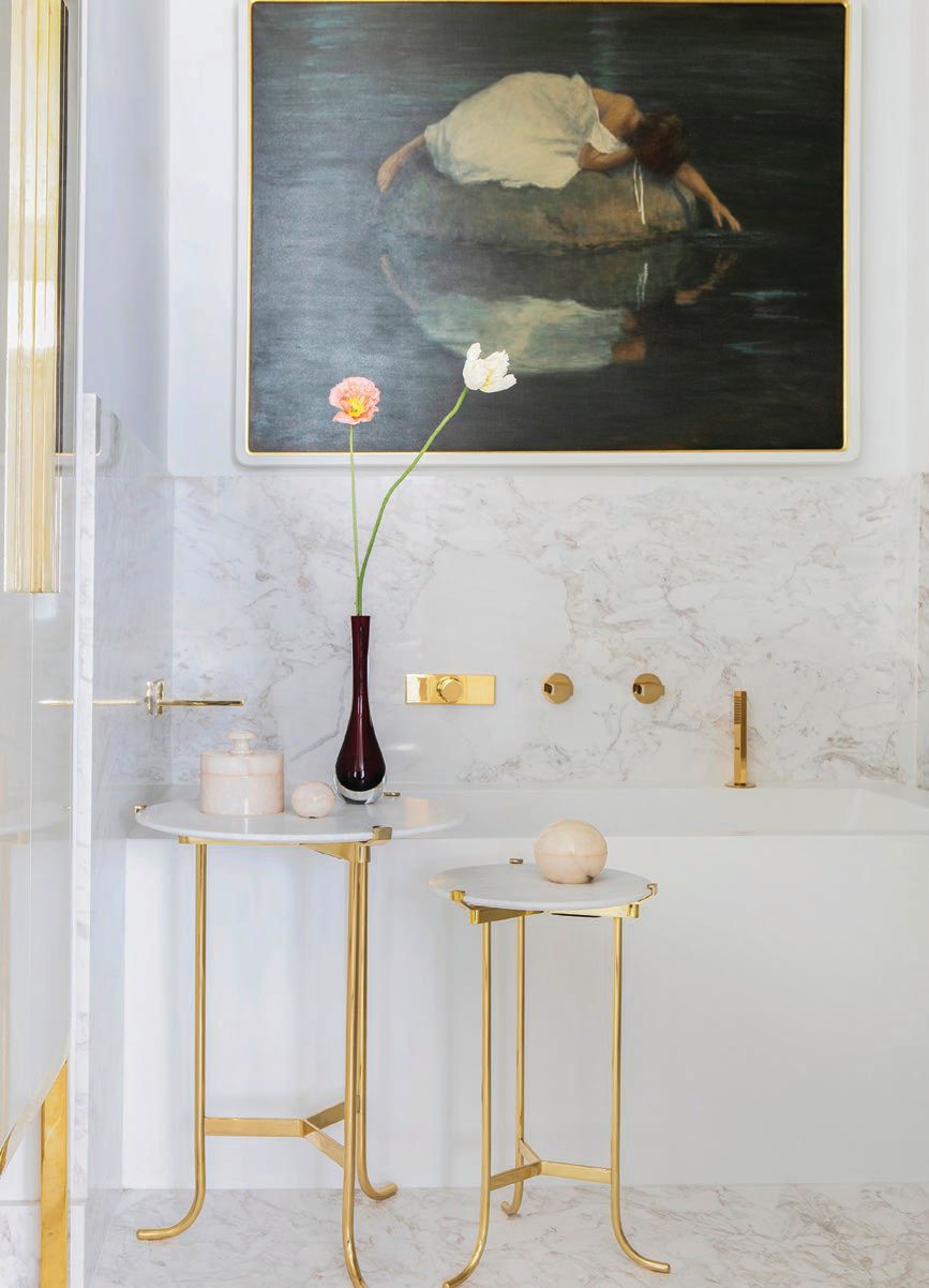 Touches of brass and gold accent a sleek bathroom Photographed by Costas Picadas
