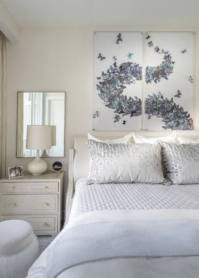 In the same home, Fava Design Group created a custom upholstered headboard wall in the master bedroom. HOME PHOTO BY BARRY GROSSMAN