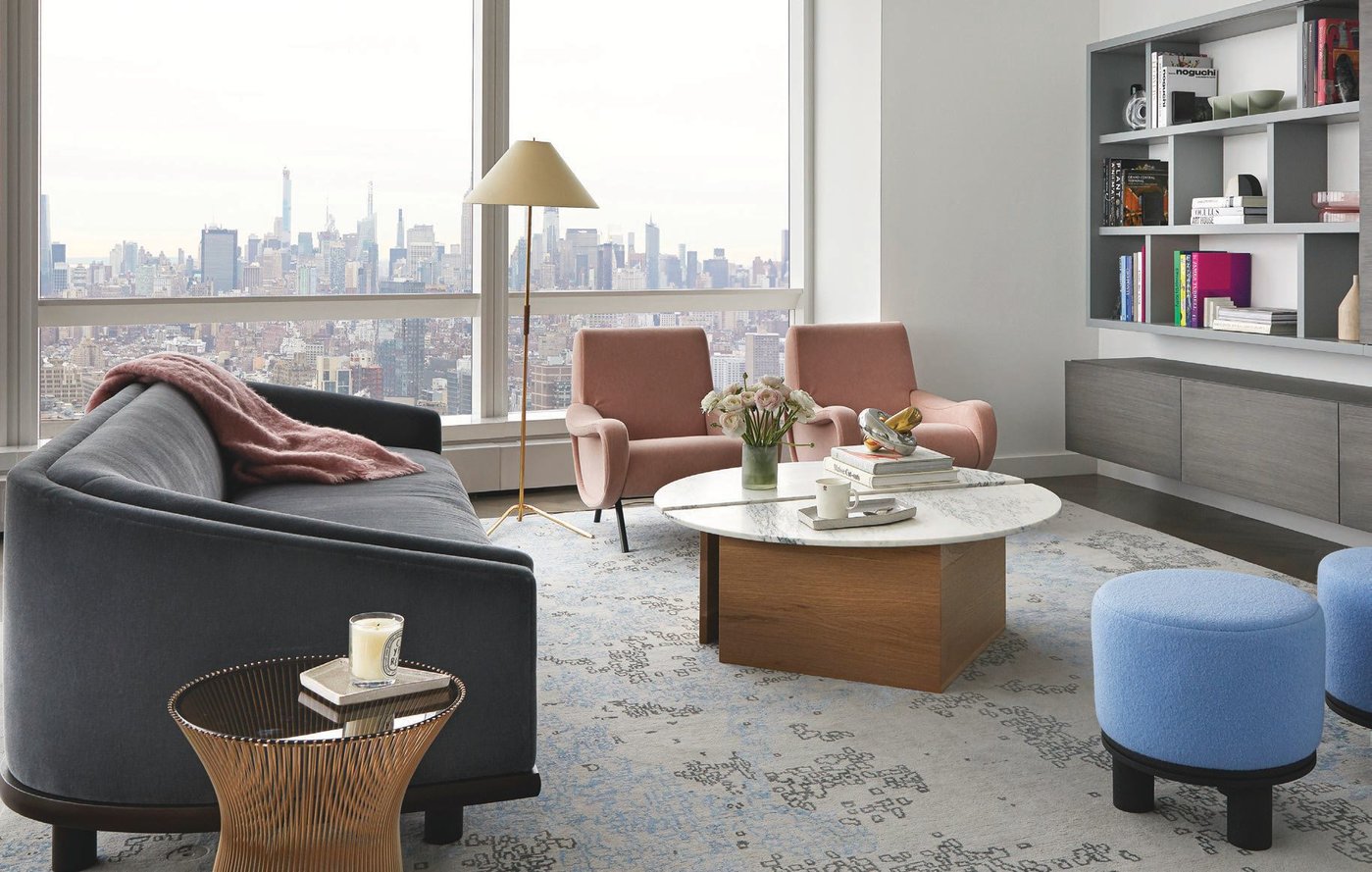 Half Moon coffee table by Ben & Aja Blanc and Lady chairs by Cassina in the living room. Photographed by Sharon Radisch