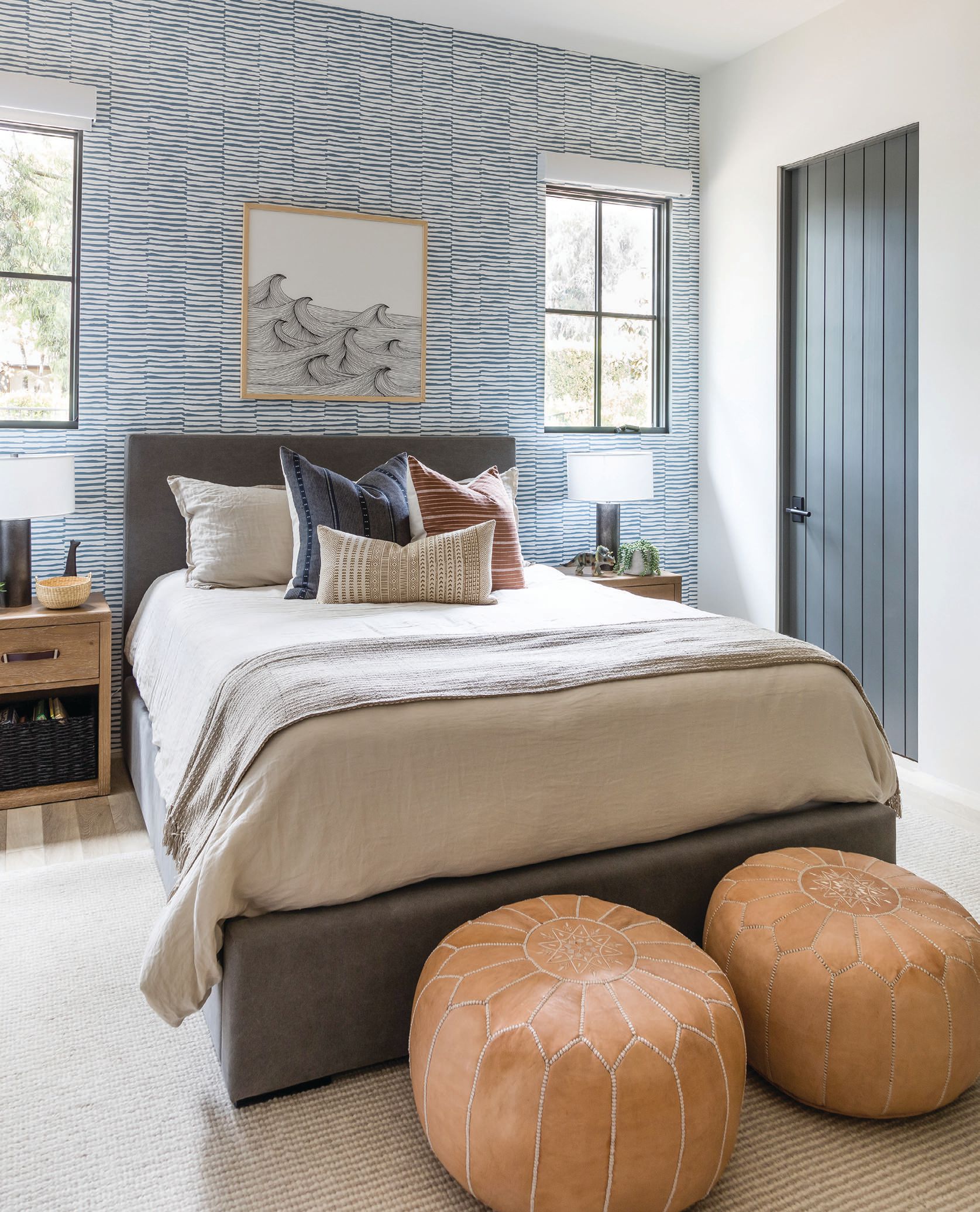 Two boys bedrooms nod to California coastal style with different shades of blue and gray woven throughout. PHOTOGRAPHED BY VANESSA LENTINE