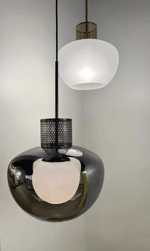Incognito 14-inch pendant in mirror smoke/gunmetal and frost/heritage brass PHOTO COURTESY OF BRAND