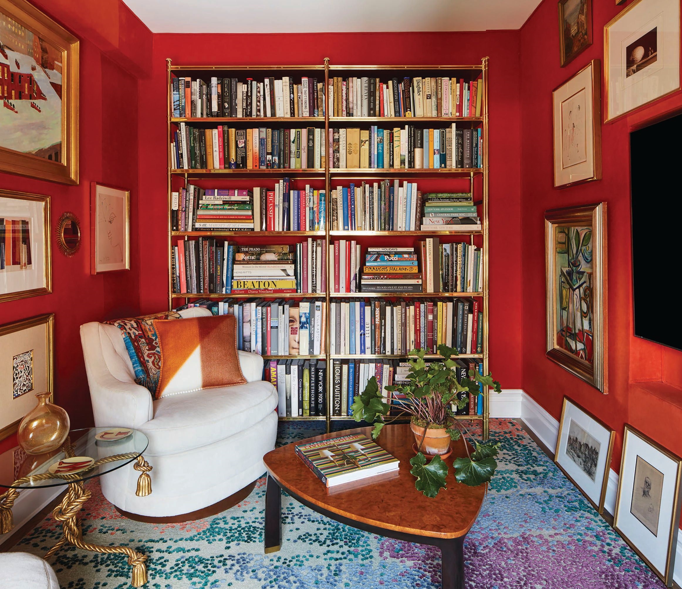 A Frederick P. Victoria & Son bookcase in the TV room. PHOTOGRAPHED BY ANNIE SCHLECTER