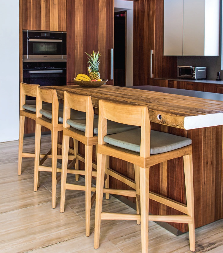 Boffi Los Angeles’ eco-friendly Duemilaotto kitchen, created from heat-treated acacia wood, is complemented by an island with a long breakfast bar designed by Hamui PHOTOGRAPHED BY ADRIANA HAMUI