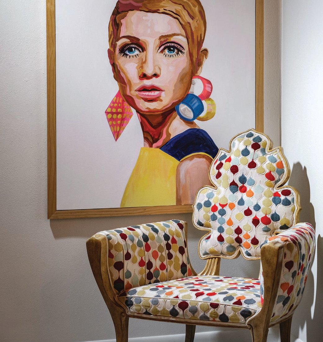 “Twiggy” by Dallas artist Lindsay Ekstrom sits above the Wiggle chair designed by Buckingham via Global Views. Photographed by Michael Woodall