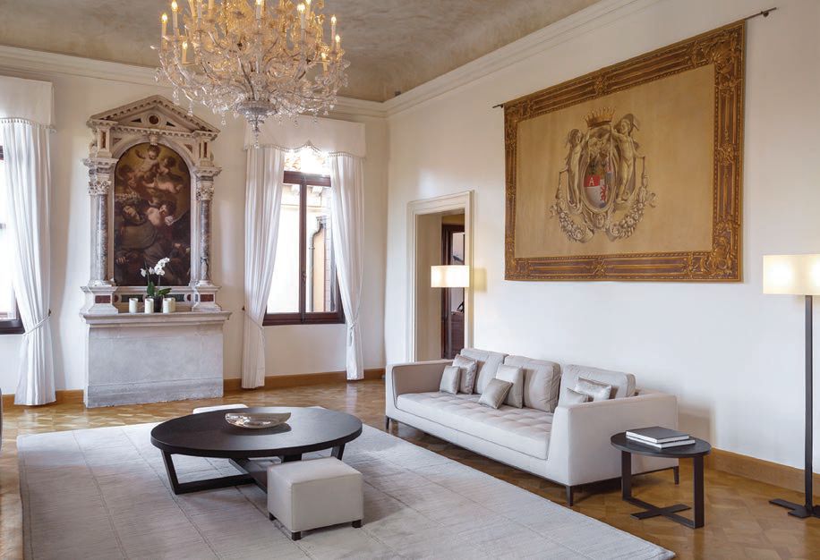 Accessed by private elevator, the three-bedroom Coccina’s Apartment features sweeping views of the Grand Canal and opulent painted ceilings and works by Italian masters  PHOTO COURTESY OF AMAN