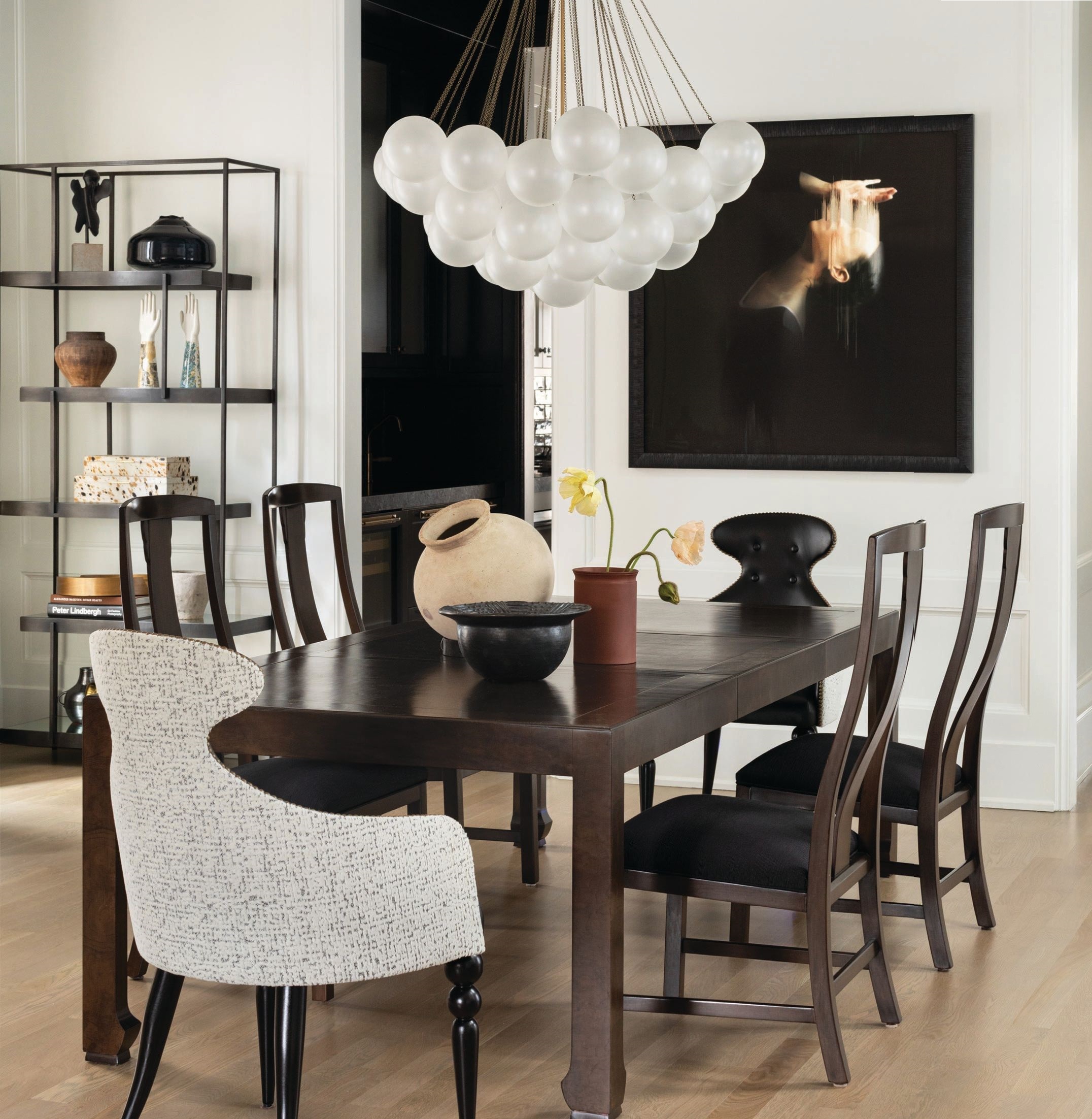 Apparatus Studio’s Cloud chandelier adds an ethereal touch to the dining room. Photographed by Aimée Mazzenga
