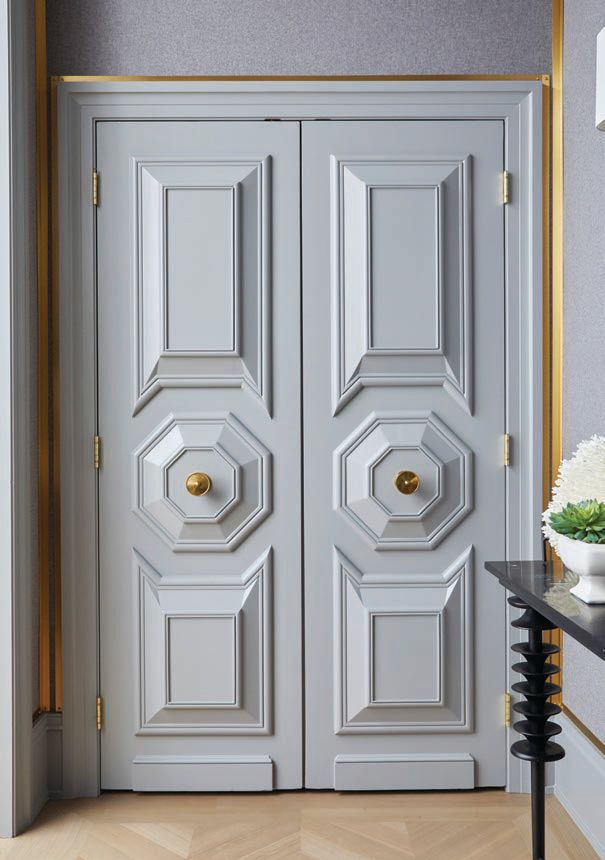 This gorgeous pair of vintage doors sourced from Paris by 1stDibs is one reason the entry is designer Brynn Olson’s favorite space in the home. Photographed by Werner Straube