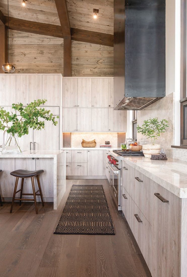 Targhee Cabin kitchens are outfitted with Earth Elements cabinets and countertops, and appliances from Sub-Zero, Wolf and Cove PHOTO COURTESY OF TRIBUTARY