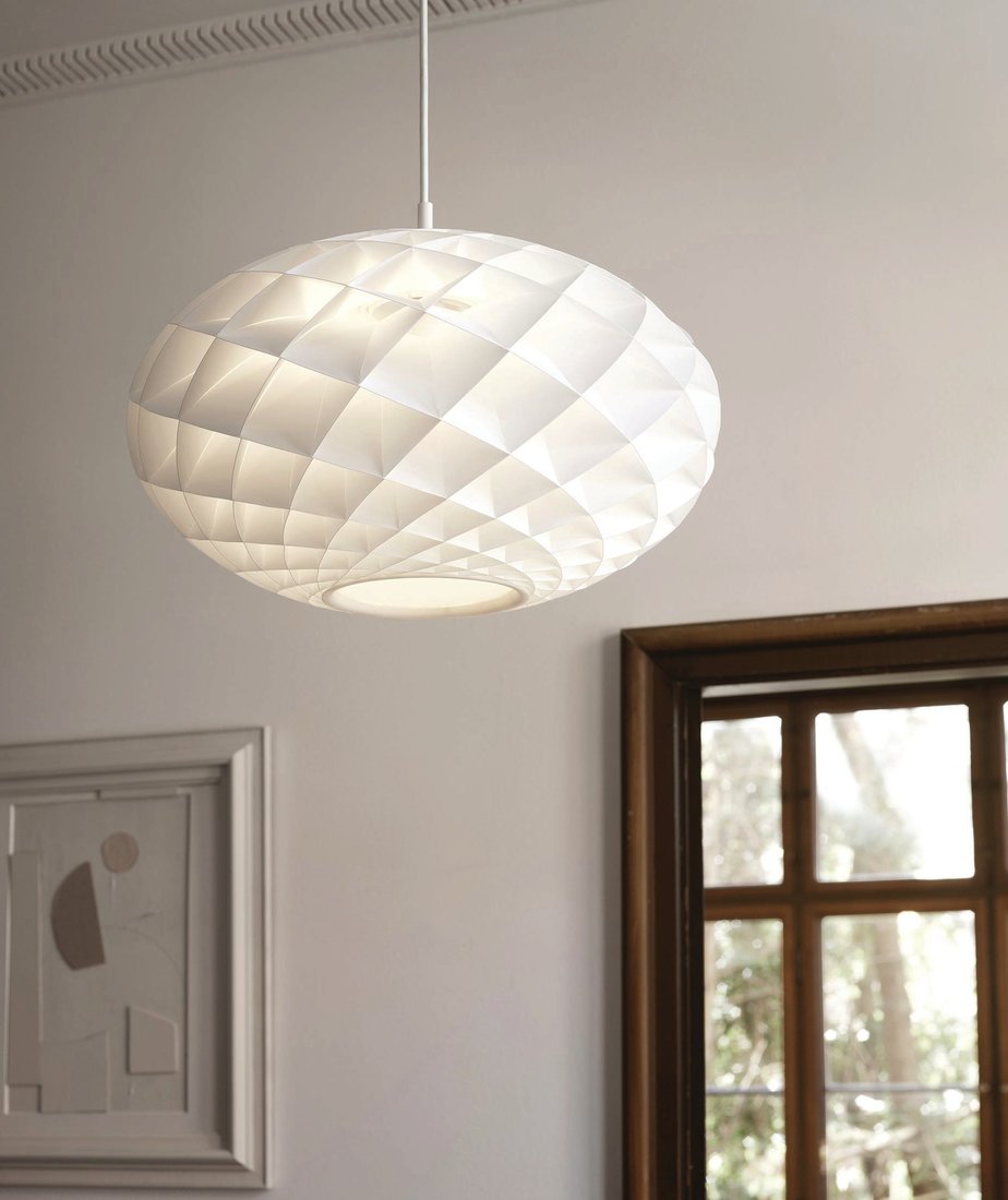 Says Øivind Slaatto, designer of the Patera Oval, “The new version is designed to hang above tables in urban apartments, where the ceiling might not be as high. I wanted to design a pendant that requires less space but still provides full light on the table.” PHOTO COURTESY OF LOUIS POULSEN