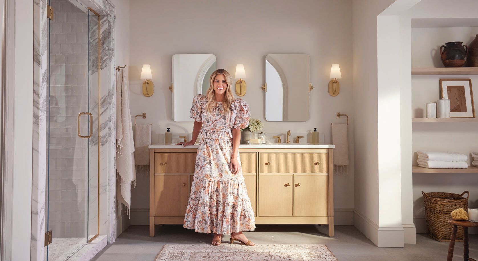 Designer Shea McGee stands beside the Malin vanity, one of the pieces from the Kohler x Studio McGee collection PHOTO COURTESY OF KOHLER