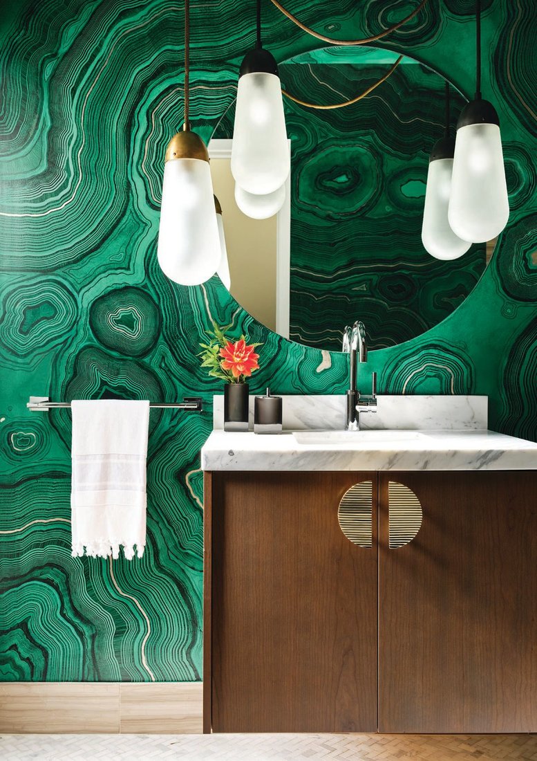 Tineke Triggs of Artistic Designs for Living worked with artist Caroline Lizarraga to create the deep-green malachite walls. PHOTO BY R. BRAD KNIPSTEIN