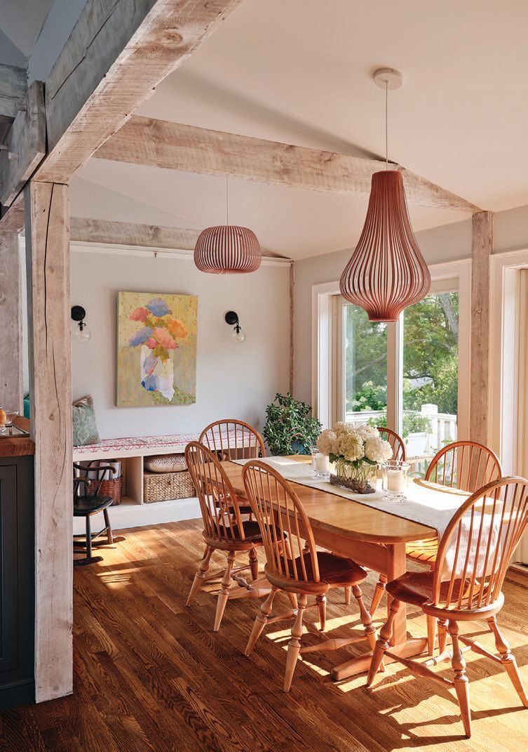 The dining room table is from Pompanoosuc Mills and the oil painting is by Carol Maguire PHOTO BY DAN CUTRONA