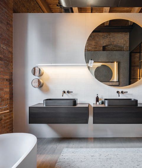 The brand’s River North showroom also showcases top-of-the-line baths, plus furniture from De Padova. PHOTO BY PETRINI STUDIO